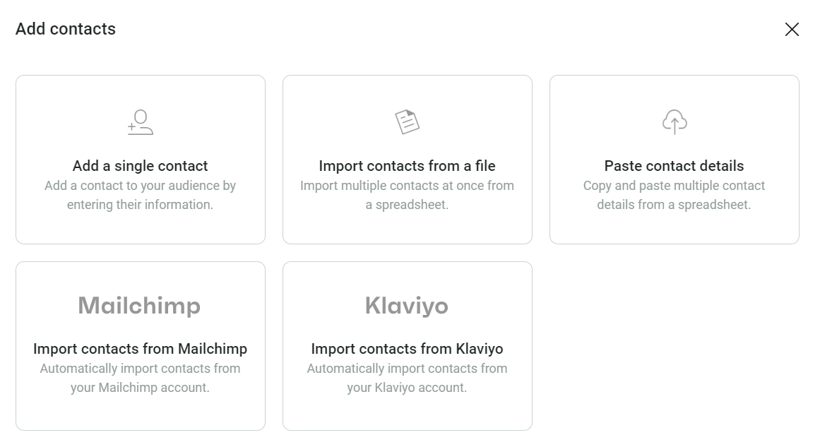 Mailchimp alternatives: Screenshot of an Add contacts interface with options to add a single contact, import contacts from a file, paste contact details, or import from Mailchimp or Klaviyo accounts.