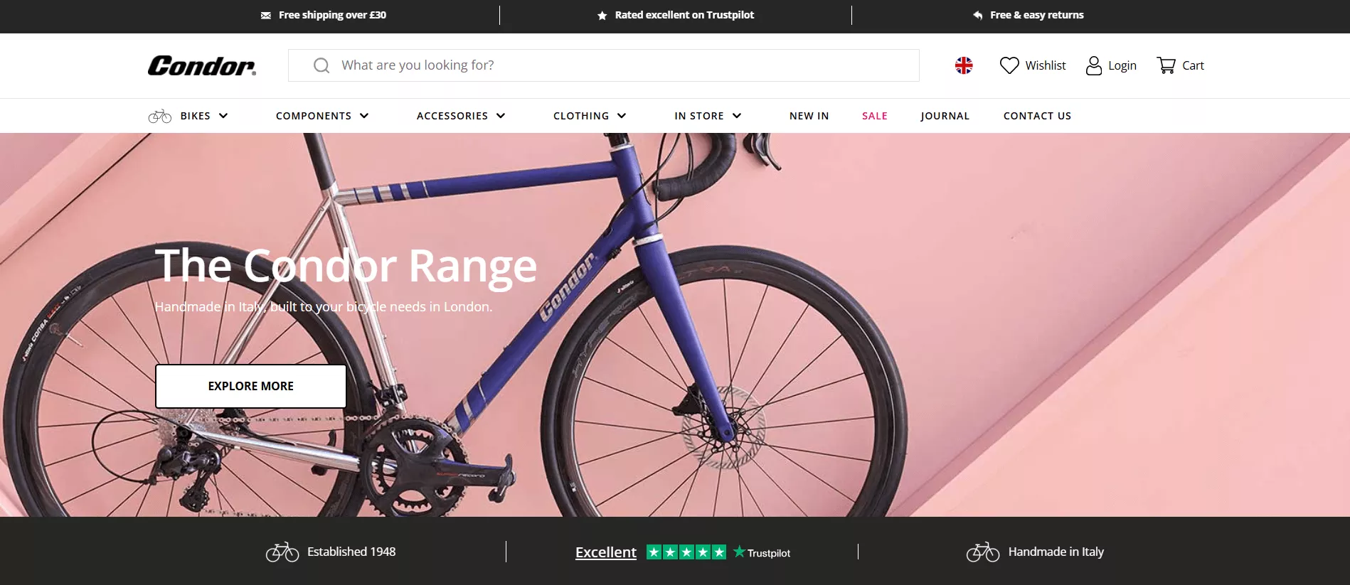 Shopify stores: Homepage of Condor, a bicycle retailer, featuring a close-up of a blue and silver bike against a pink wall. Main menu and navigation options are visible at the top of the page.